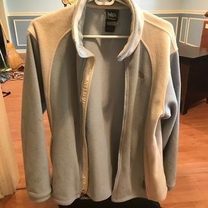 light blue and white women's North Face jacket